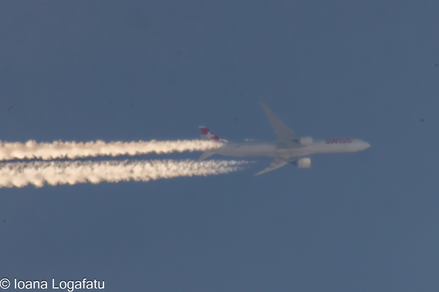 Majestic aircraft gliding through a clear sky